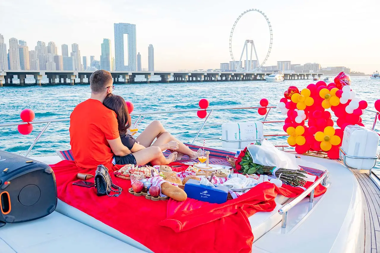 A yacht carrying a couple on the water