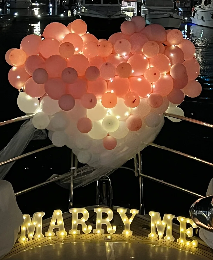 Balloon decorations and lights on the yacht deck “MARRY ME”!