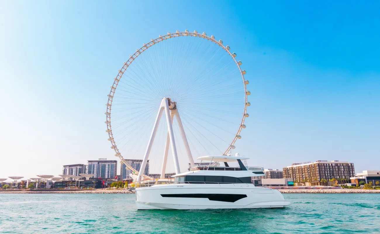 Take a boat rental in Dubai to enjoy the skyline and Ain Dubai.