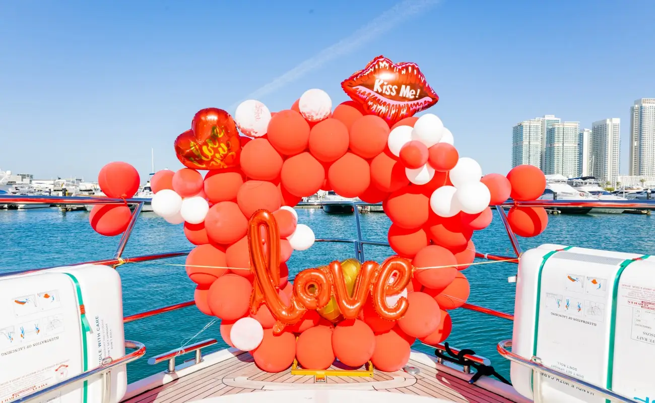 Hire a Dubai yacht decorated with roses for a marriage proposal.