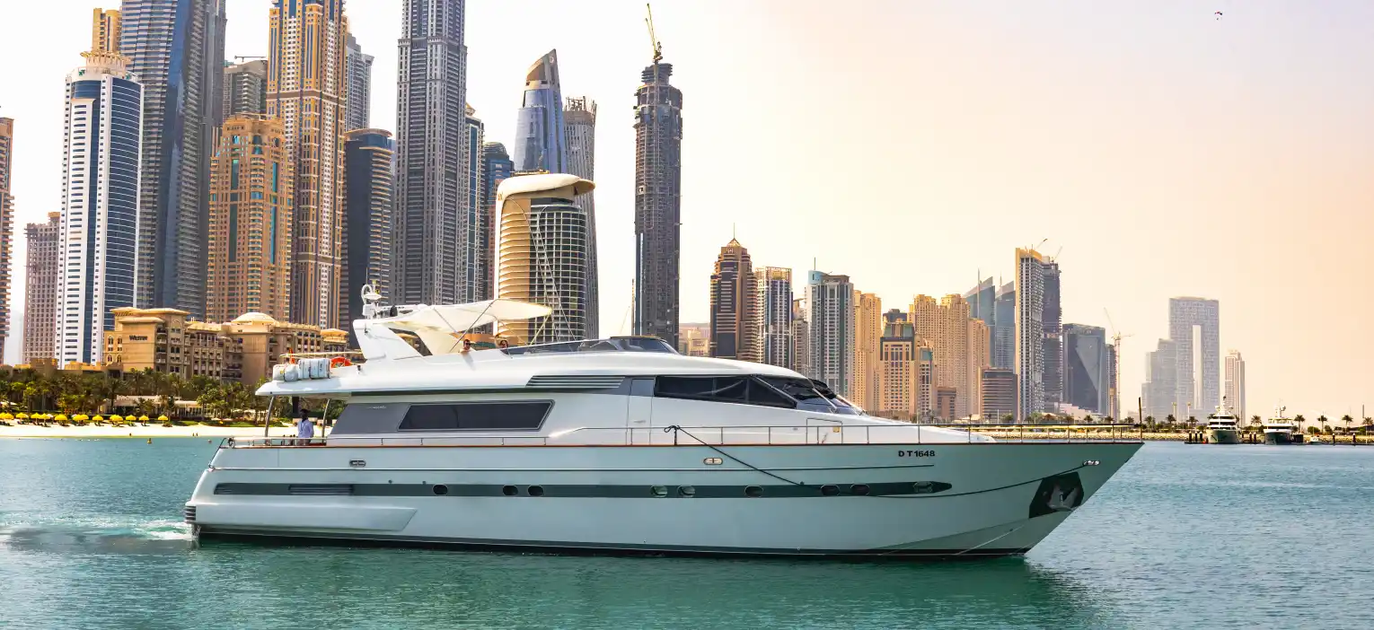 yacht docked alongside dubai's skyline, the cruise vessel for dubai marina sunset cruise