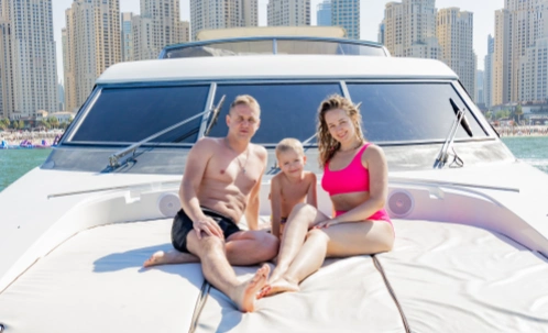 people relax on the luxury yacht deck while taking the dubai yacht cruise