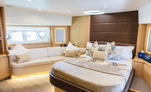 spacious luxury seating area inside the yacht for dubai yacht cruise