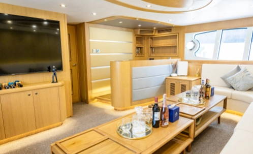 well-stocked bar with complimentary drinks onboard dubai yacht cruise