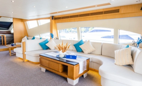 cozy lounge area with cushions in the luxury dubai yacht cruise