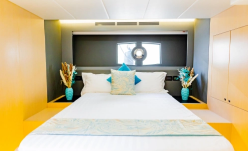 unwind in the peaceful cabin of your sunset yacht cruise, a perfect retreat during your journey.