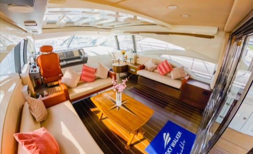 unwind in the comfortable air-conditioned indoor lounge during your dubai marina luxury boat ride with onboard bbq dining