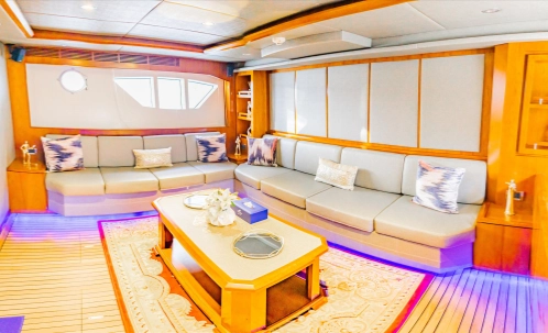 the elegant lounge area provides a stylish space to unwind on your dubai marina yacht cruise, where you can savor the bbq lunch while taking in the views of atlantis and burj al arab.