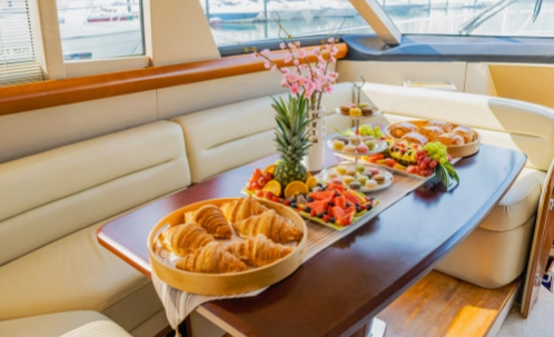 indulge in fresh live bbq skewers and refreshing drinks during your bluewaters island dubai yacht tour, complete with an open bar and onboard catering.