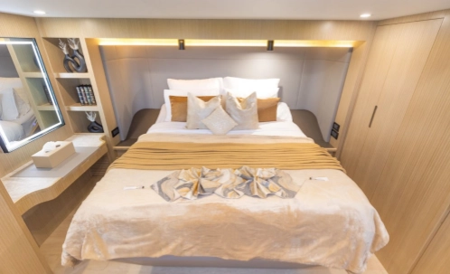 spacious and elegant stateroom interior on dubai boat tour yacht