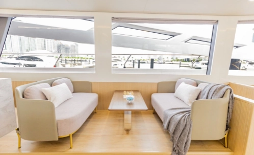 modern and bright living room lounge on dubai boat tour yacht
