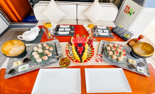 romantic dining setup for couples on board dubai harbour couples yacht cruise dinner yacht