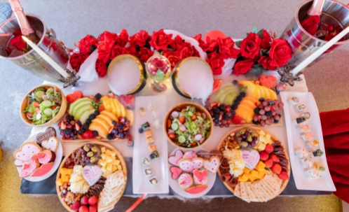 gourmet fruit platter and assorted bbq dishes served on dubai harbour couples yacht cruise