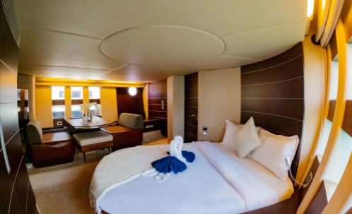 discover the luxurious interior of our yacht, featuring a fully air-conditioned lounge with free wifi, as part of your dubai marina boat tour—perfect for couples, families, or solo travelers on a 1-hour cruise with drinks included.