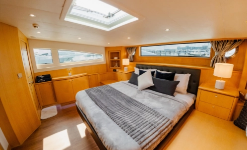 comfortable cabin interior of luxury dubai marina yacht, ideal for shared sunset cruise with live bbq dinner