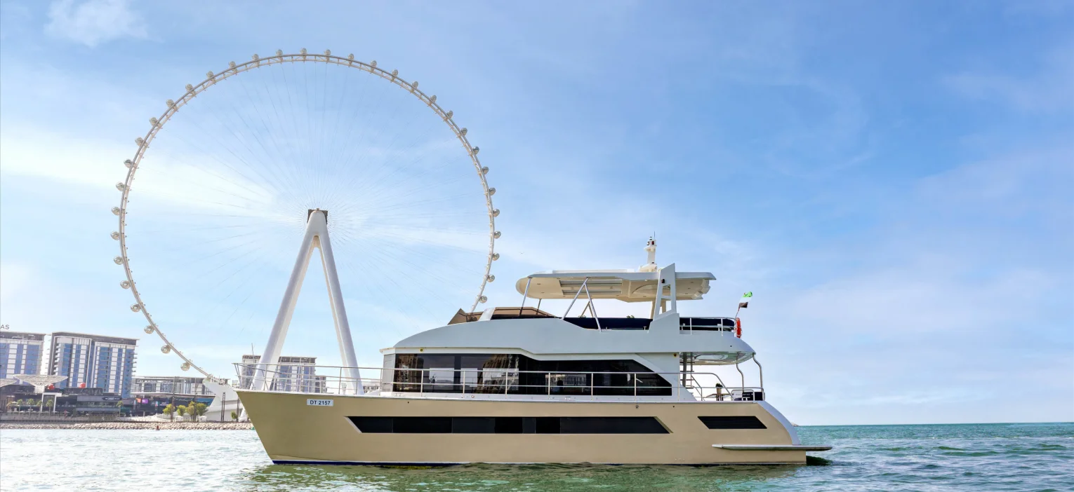 modern luxury yacht sailing near ain dubai, showcasing the scenic route of the dubai marina luxury yacht cruise