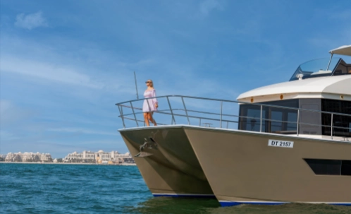 sleek yacht bow floating on calm dubai waters, capturing the elegance of the dubai marina luxury yacht cruise