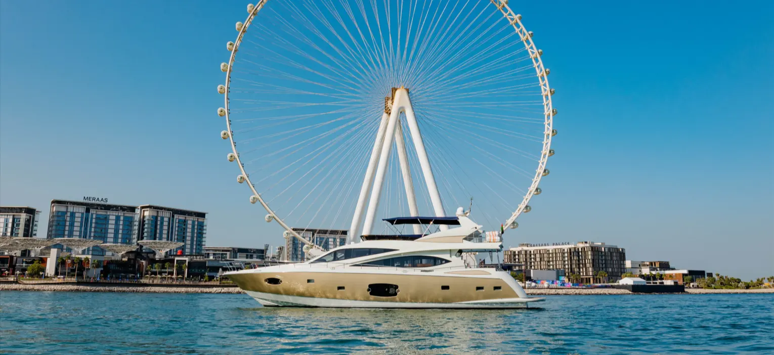 dubai harbour yacht tour offers a stunning view of ain dubai, with a luxury yacht cruising gracefully in the foreground, capturing the iconic skyline of dubai’s waterfront.