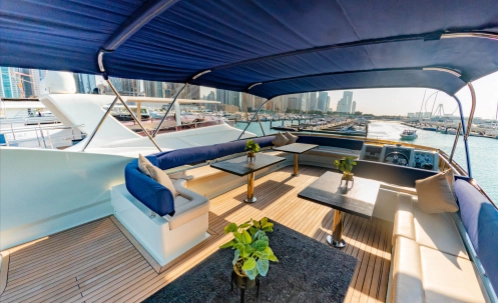 this dubai harbour shared afternoon yacht tour features a spacious outdoor lounge area, perfect for enjoying the fresh sea breeze and preparing for the included bbq lunch during the cruise.
